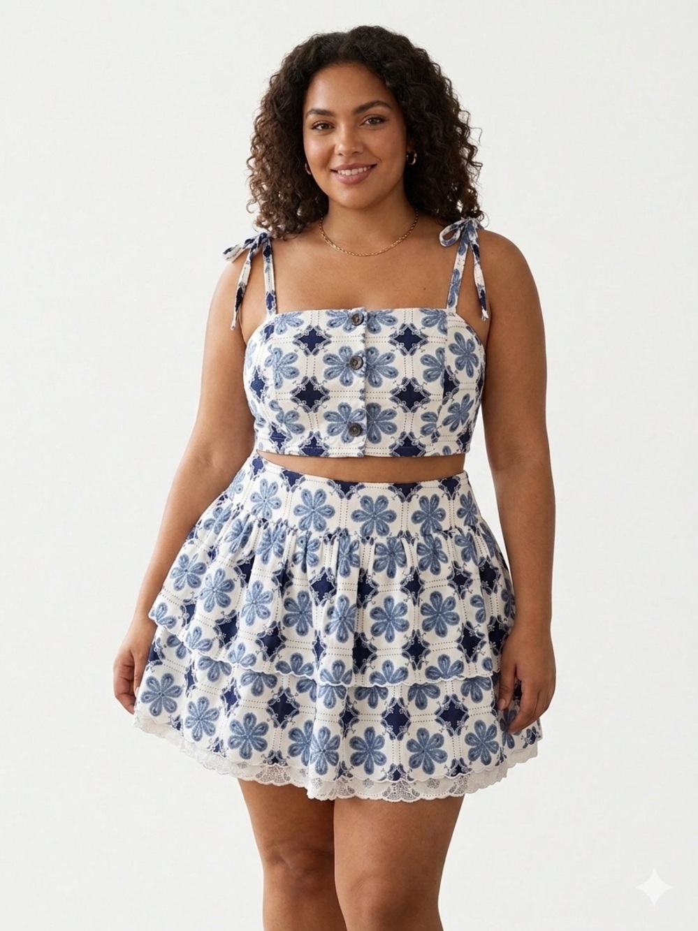Agua Bendita blue and white floral mini skirt and top set.